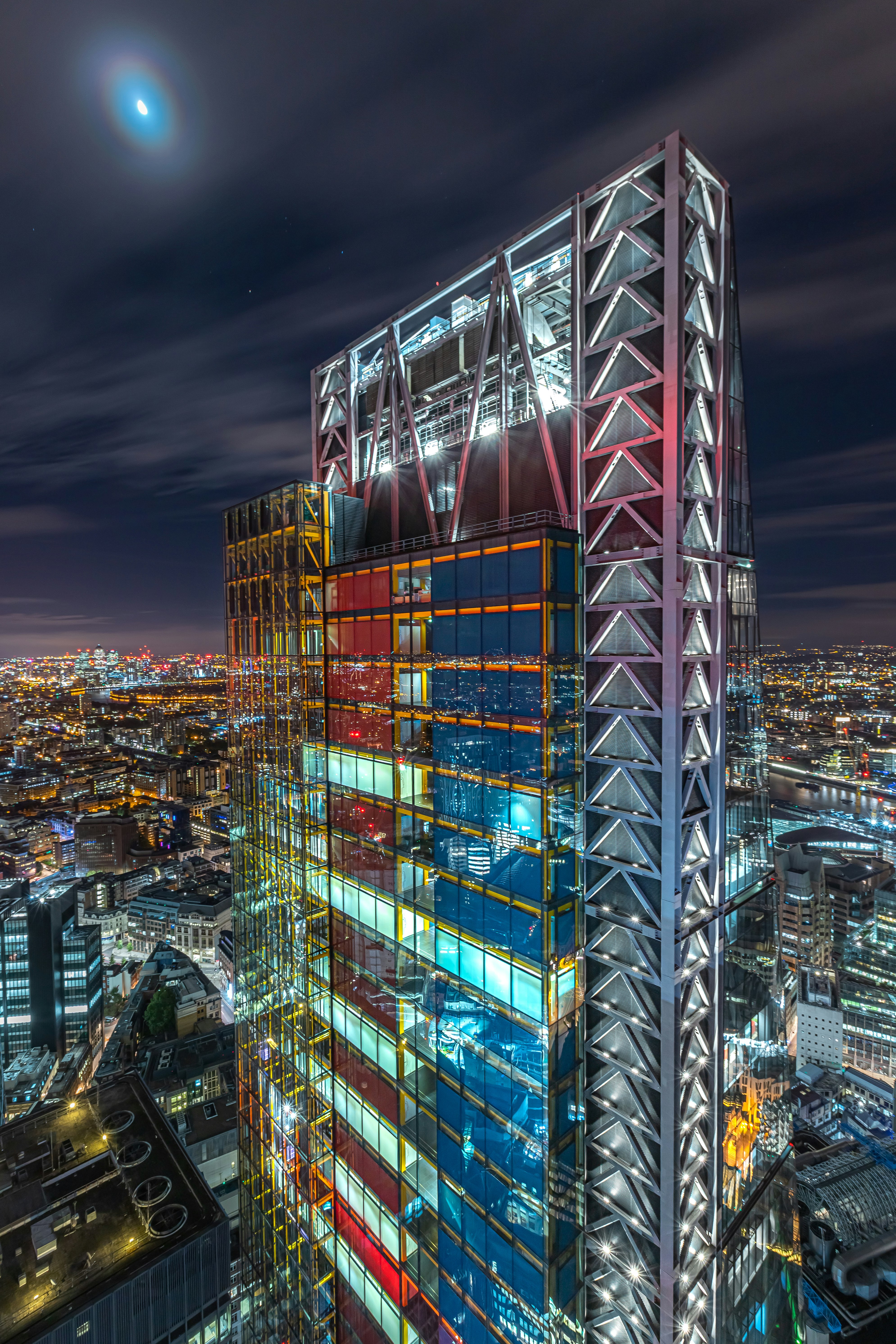 city with high rise buildings during night time